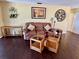 Living room with sofa and wooden coffee table at 1111 Faith W Cir # 2003, Bradenton, FL 34212