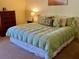 Comfortable main bedroom with a king-size bed and ample closet space at 1111 Faith W Cir # 2003, Bradenton, FL 34212