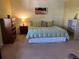 Spacious main bedroom with king-size bed and plenty of storage at 1111 W Faith Cir # 2003, Bradenton, FL 34212