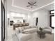 Open concept living room and kitchen with island at 12198 Terkelsen Ave, Port Charlotte, FL 33981