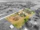 Large lot with home, garden, and outbuildings at 14900 Coker Gully Rd, Myakka City, FL 34251