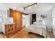 Charming bedroom with wood floors and built-in closet at 14900 Coker Gully Rd, Myakka City, FL 34251