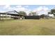 Spacious lot with covered parking, barn, and farmhouse at 14900 Coker Gully Rd, Myakka City, FL 34251