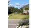 House with well-manicured front lawn at 15145 Spanish Point Dr, Port Charlotte, FL 33981