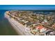Aerial view showing beachfront home and surroundings at 15815 Redington Dr, Redington Beach, FL 33708