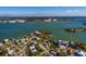 Aerial view of a waterfront home near a bridge at 15815 Redington Dr, Redington Beach, FL 33708