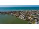 Aerial view showing home's location on the waterfront at 15815 Redington Dr, Redington Beach, FL 33708