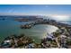 Aerial view showcasing home's waterfront location at 15815 Redington Dr, Redington Beach, FL 33708
