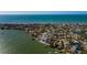Aerial view of waterfront property near the beach, showcasing a desirable location at 15815 Redington Dr, Redington Beach, FL 33708