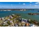 Aerial view showcasing a home's location in a desirable waterfront community at 15815 Redington Dr, Redington Beach, FL 33708