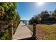 Private wooden dock leading to the water at 15815 Redington Dr, Redington Beach, FL 33708