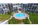 Aerial view of building with pool at 19 Whispering Sands Dr # 301, Sarasota, FL 34242