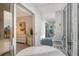 Private balcony with seating and view of bedroom at 19 Whispering Sands Dr # 301, Sarasota, FL 34242