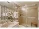 Bathroom with shower and vanity at 19 Whispering Sands Dr # 301, Sarasota, FL 34242