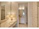 Bathroom with vanity, sink, and shower at 19 Whispering Sands Dr # 301, Sarasota, FL 34242