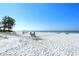Relax on the beach with lounge chairs available at 19 Whispering Sands Dr # 301, Sarasota, FL 34242