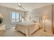 Main bedroom with ocean view and sliding door access to balcony at 19 Whispering Sands Dr # 301, Sarasota, FL 34242