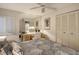 Bedroom with built-in desk and closet at 19 Whispering Sands Dr # 301, Sarasota, FL 34242