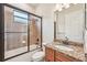 Updated bathroom with granite vanity, tub shower combo and tile flooring at 20345 Reale Cir, Venice, FL 34293
