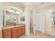 Bathroom with granite vanity and toilet at 20345 Reale Cir, Venice, FL 34293