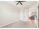 Bedroom with double doors and access to another room at 20345 Reale Cir, Venice, FL 34293