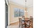Cozy dining area with window and chandelier at 20345 Reale Cir, Venice, FL 34293