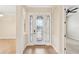 Interior entryway with tile flooring and stained glass door at 20345 Reale Cir, Venice, FL 34293