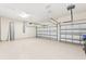 Two-car garage with automatic openers and epoxy floor at 20345 Reale Cir, Venice, FL 34293