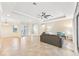 Open living room with tile floors and neutral color palette at 20345 Reale Cir, Venice, FL 34293