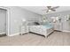 Spacious main bedroom with king-size bed and ensuite bathroom at 2232 Hively St, Sarasota, FL 34231