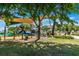 Modern playground with shade structures, near water at 2232 Hively St, Sarasota, FL 34231