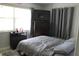 Comfortable bedroom with a dresser and plenty of closet space at 22342 Augusta Ave, Port Charlotte, FL 33952