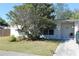 Cute ranch home with mature landscaping and a long driveway at 22342 Augusta Ave, Port Charlotte, FL 33952