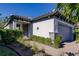 Charming single-Gathering home with a paved walkway and a two-car garage in a landscaped yard at 2479 Brassica Dr, North Port, FL 34289