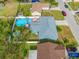 House with a backyard pool and patio, aerial view at 3204 6Th W Ave, Palmetto, FL 34221