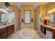 Luxurious bathroom with double vanity, soaking tub, and tile flooring at 3706 162Nd E Ave, Parrish, FL 34219