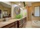 Large bathroom with granite countertops and double sinks at 3706 162Nd E Ave, Parrish, FL 34219