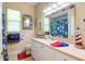 Nautical-themed bathroom with a lighthouse decor at 3706 162Nd E Ave, Parrish, FL 34219