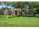 Stunning home with mature trees and a well-manicured lawn at 3706 162Nd E Ave, Parrish, FL 34219