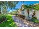 Landscaped walkway leading to home entrance at 3706 162Nd E Ave, Parrish, FL 34219