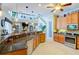 Spacious kitchen with island, granite counters, and stainless steel appliances at 3706 162Nd E Ave, Parrish, FL 34219