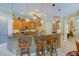 Island kitchen with granite countertops and breakfast bar seating at 3706 162Nd E Ave, Parrish, FL 34219