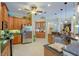 Open kitchen with island, granite countertops, and stainless steel appliances at 3706 162Nd E Ave, Parrish, FL 34219