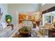 Open concept living room with views of kitchen and backyard at 3706 162Nd E Ave, Parrish, FL 34219