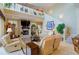 Spacious living room with high ceilings, fireplace, and plenty of natural light at 3706 162Nd E Ave, Parrish, FL 34219