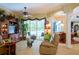 Spacious living room with a view of the pool and a comfy seating area at 3706 162Nd E Ave, Parrish, FL 34219