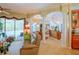 Open concept living space with a view of the kitchen and pool at 3706 162Nd E Ave, Parrish, FL 34219