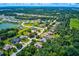 An aerial view of a beautiful neighborhood with lush landscaping and serene lakes at 3706 162Nd E Ave, Parrish, FL 34219