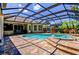 Inviting pool and spa with screened enclosure at 3706 162Nd E Ave, Parrish, FL 34219