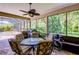 Covered patio with outdoor seating and a built-in grill at 3706 162Nd E Ave, Parrish, FL 34219